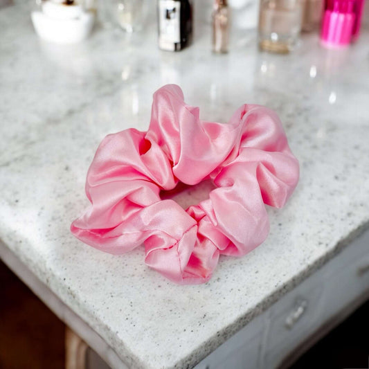 Pink satin scrunchie by Dabble Doll designed for girls and women, perfect for stylish hair accessories