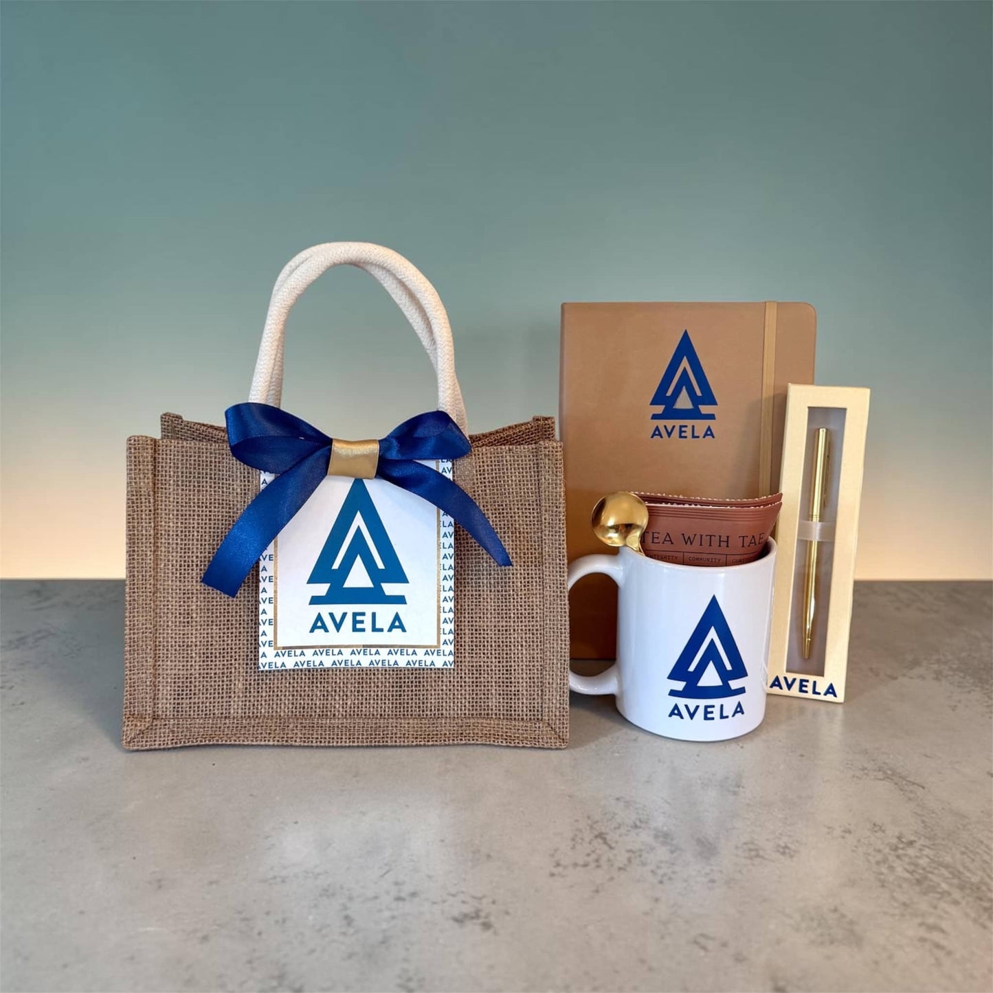 Avel Gift Box for Women featuring a Jute Bag, Coffee Mug, Journal, and Pen in Elegant Design
