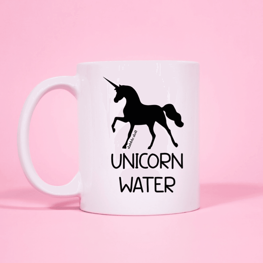 Dabble Doll Coffee Mug featuring a unicorn design and the text Unicorn Water for unique gift ideas