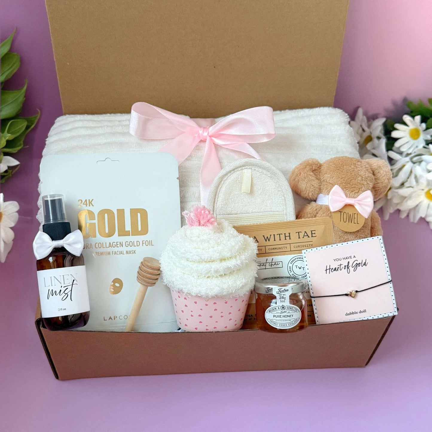 Dabble Doll cozy blush pamper set gift box with towel, cupcake scrub, gold face mask, and spa accessories