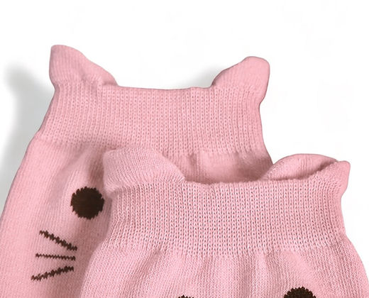 Close-up of cute pink cat socks with cat face design and small ear details on top