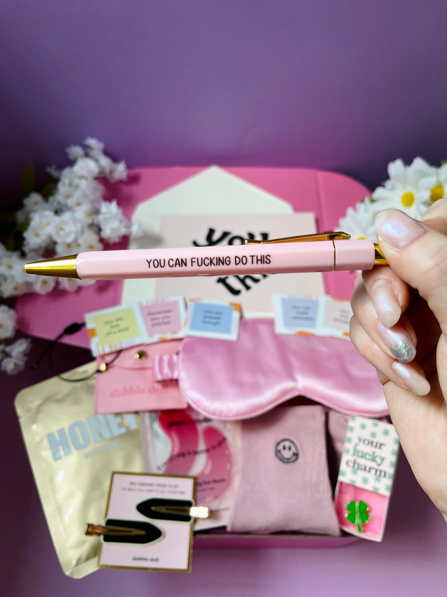 Dabble Doll good luck gift box with motivational pen pink eye mask and charm accessories
