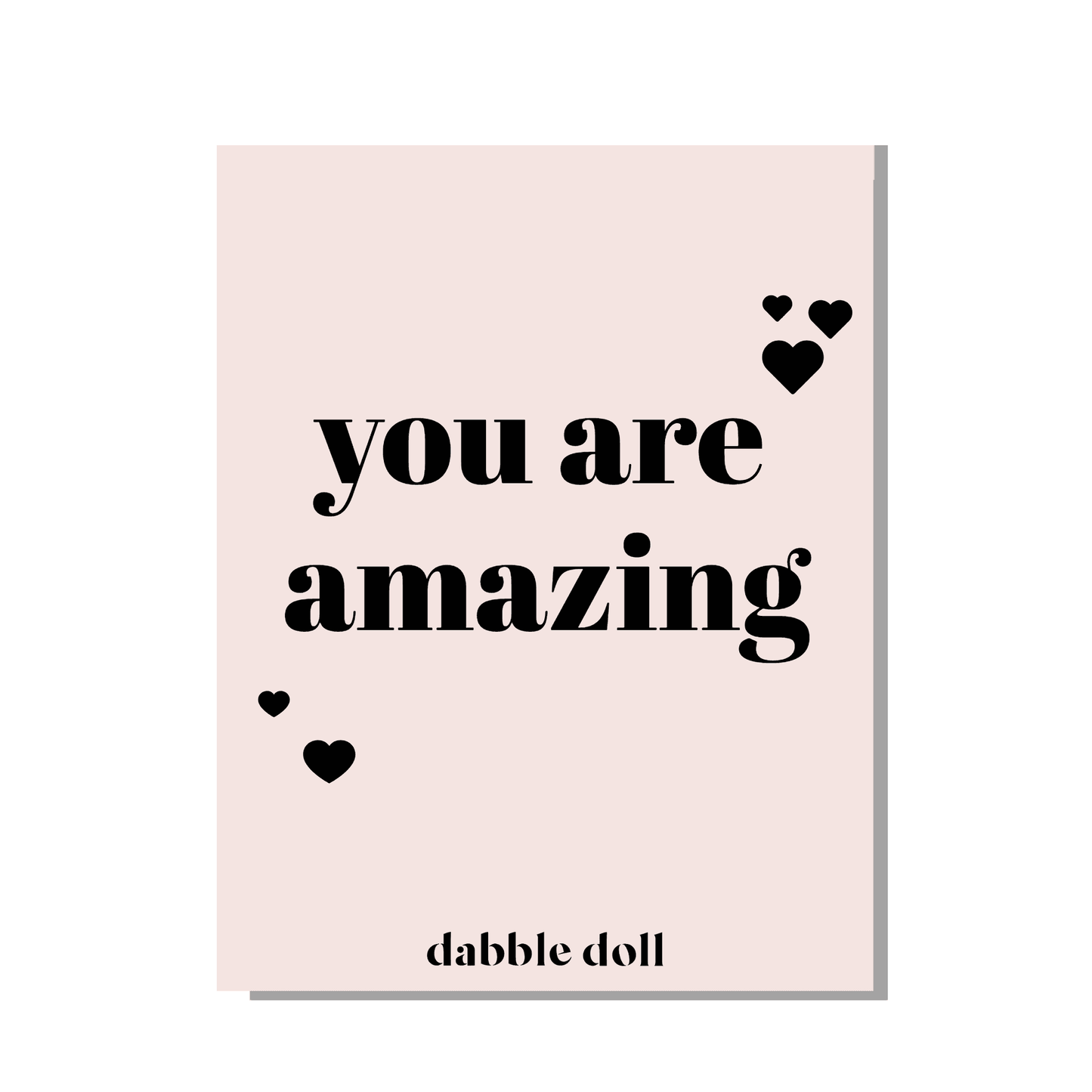 Dabble Doll pink greeting card with black lettering 'you are amazing' designed for girls and women
