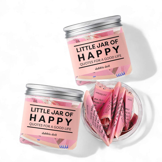 Dabble Doll happy jar gift box with pink scrolls containing quotes for a good life in clear jars with silver lids