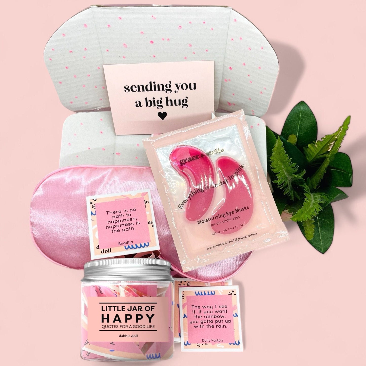 Dabble Doll happy jar gift set featuring moisturizing eye masks silk sleeping mask and inspirational quote jar