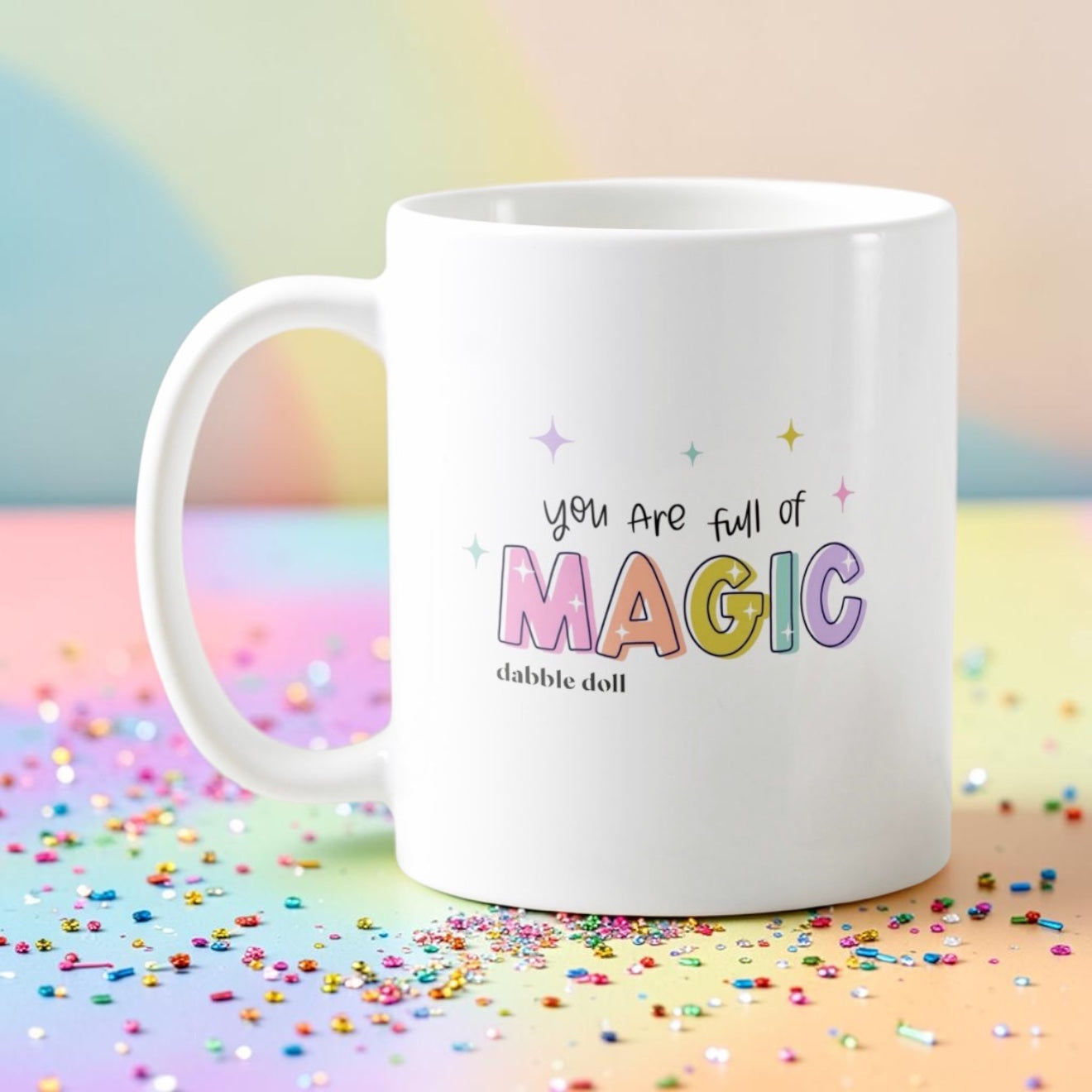 Dabble Doll magic mug with colorful text saying You Are Full of Magic on a confetti background