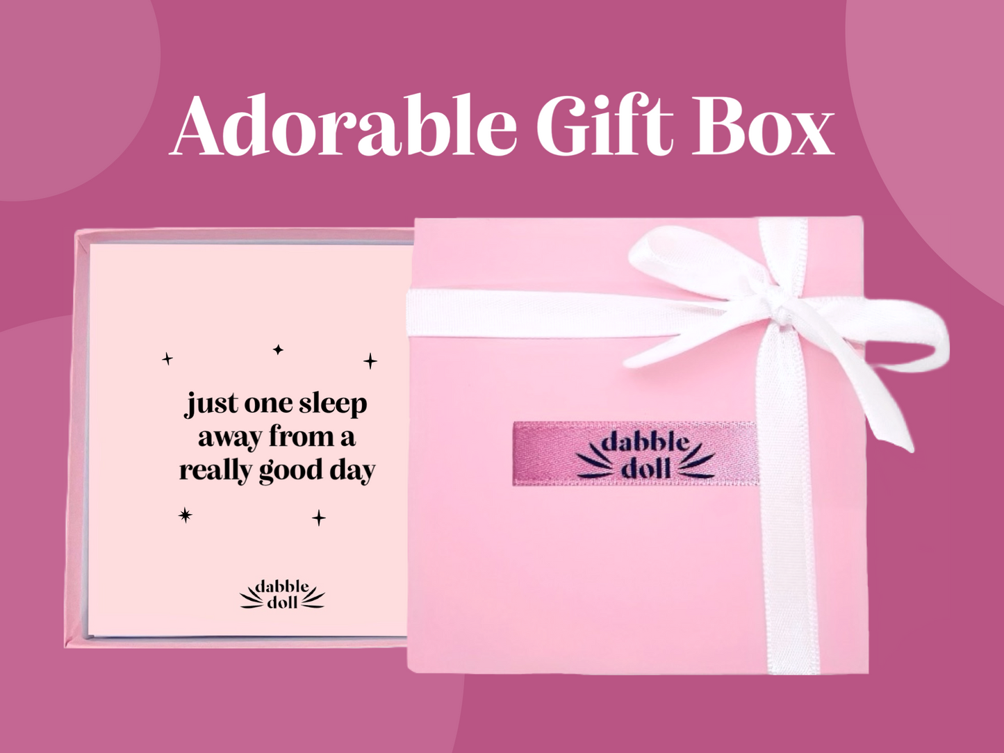 Dabble Doll adorable gift box with a pink silky sleep mask and a message card inside