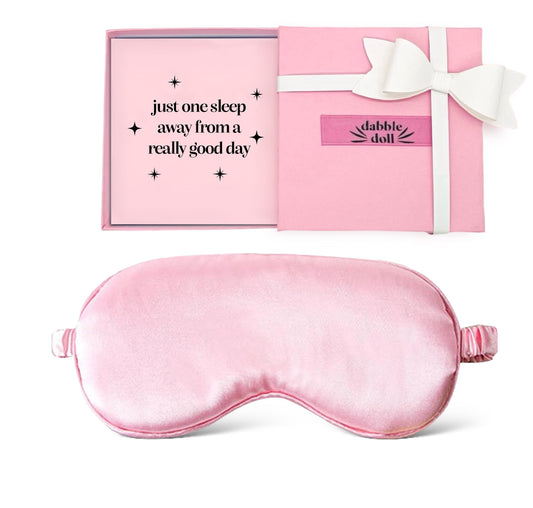 Dabble Doll pink silky sleep mask with matching pink gift box and white ribbon bow
