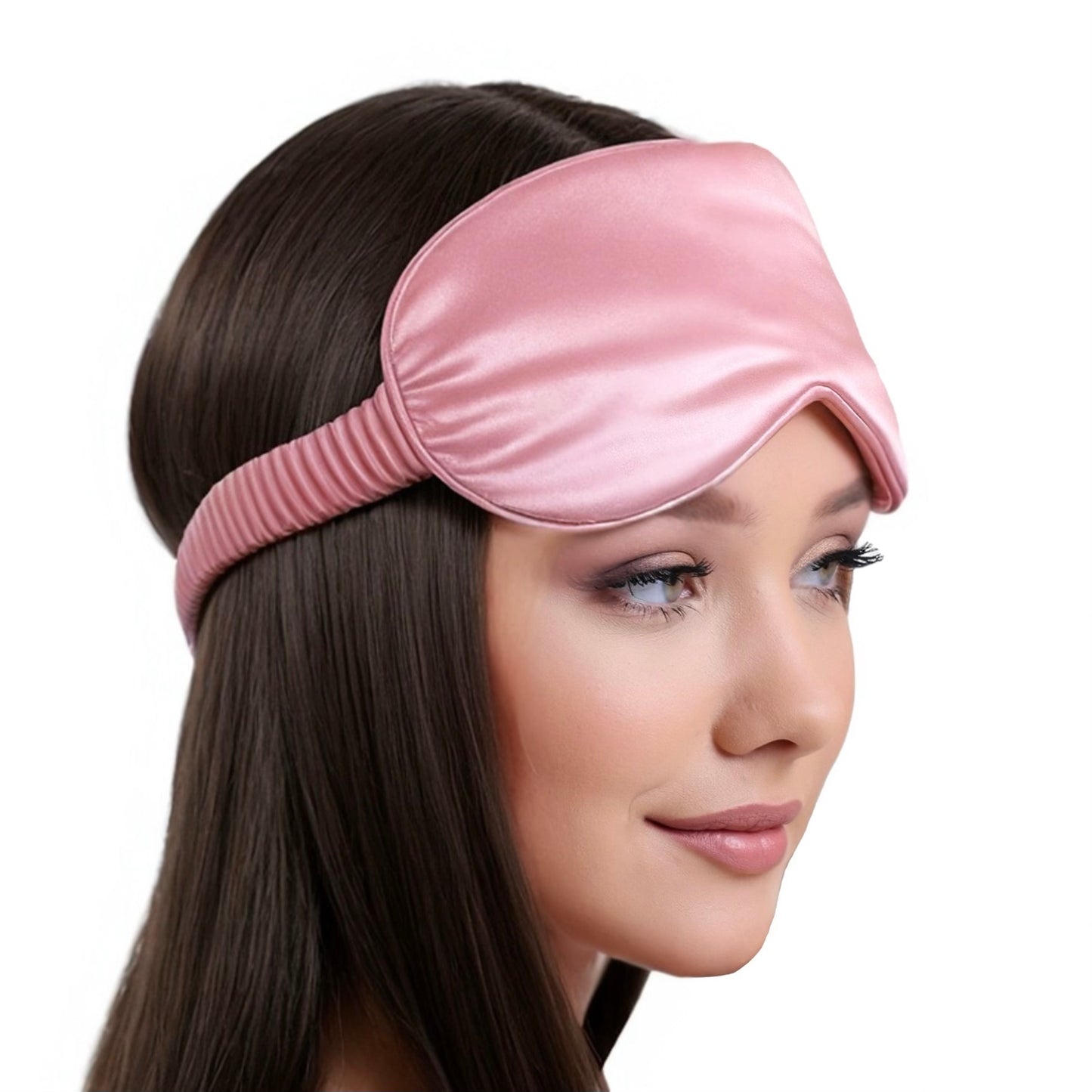 Dabble Doll gift box featuring a pink silky sleep mask worn by a woman with long brown hair