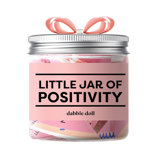 Dabble Doll little jar of positivity with pink label and ribbon positivity jar gift