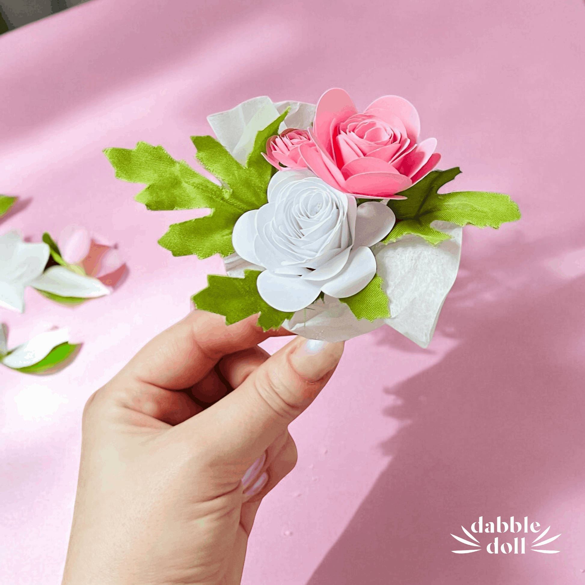 Dabble Doll self care gift box for her featuring delicate pink and white paper flowers with green leaves