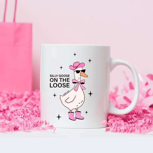 Funny coffee mug featuring a silly goose in sunglasses and a bow, perfect for humorous gift giving