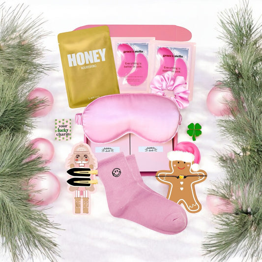 Pink Gift Box for girls with sleep mask, socks, and fun accessories for relaxation and beauty