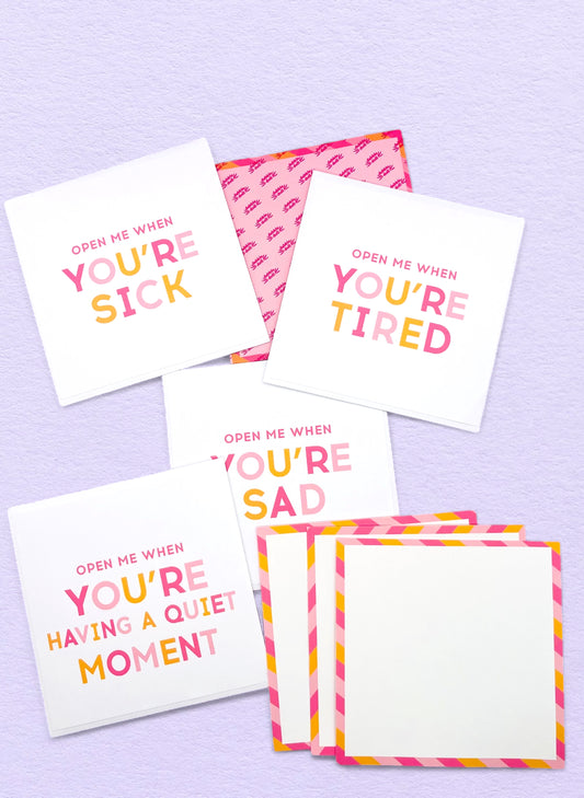 Dabble Doll Open Me When set of colorful cards for girls and women, featuring encouraging messages in pink and orange.