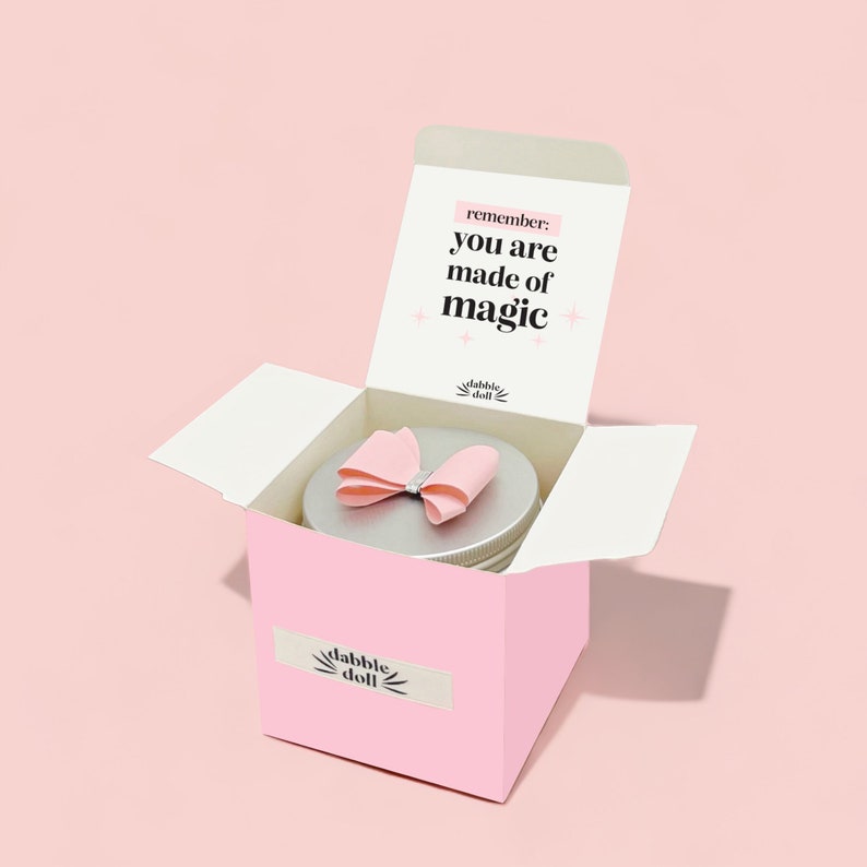 Pink Dabble Doll gift box with magical note and bow for women, designed as a personalized gift