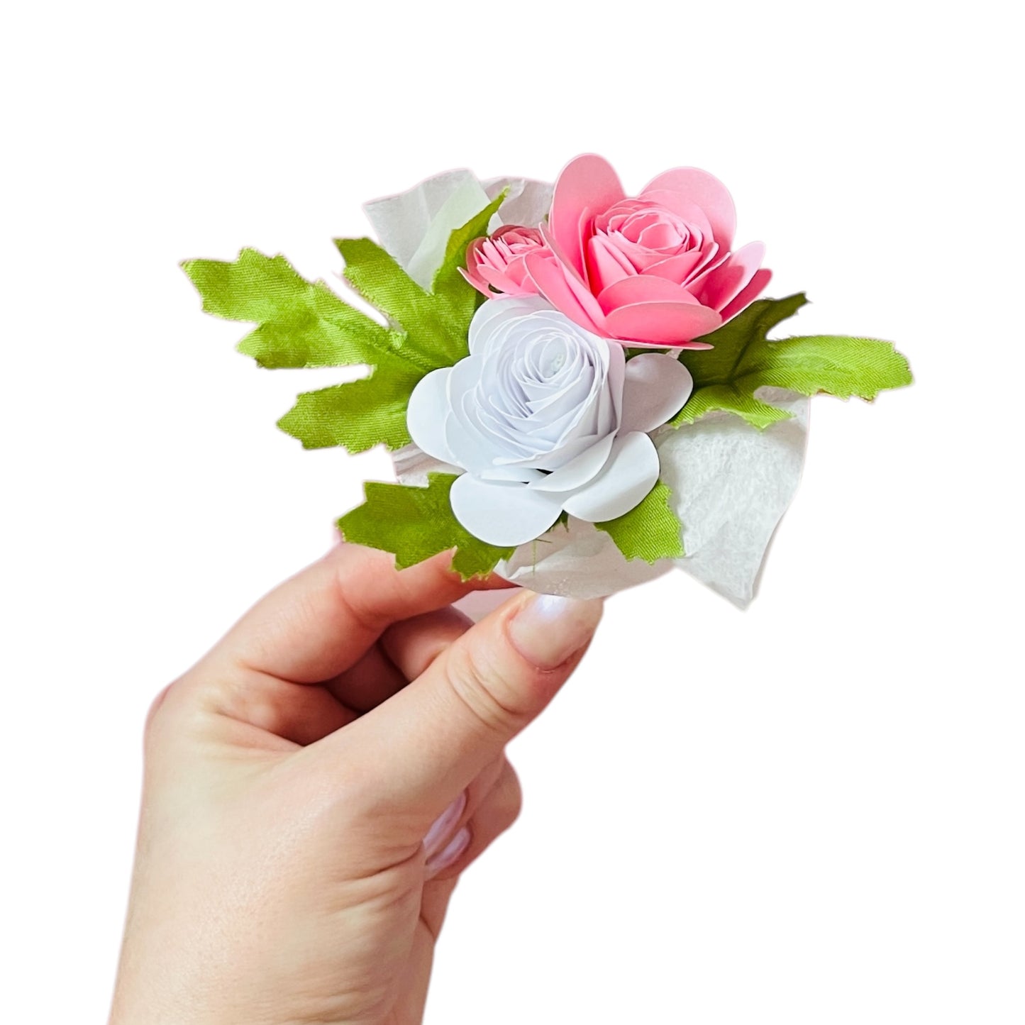 Romantic gift box for wife featuring handcrafted pink and white paper roses with green leaves held in hand