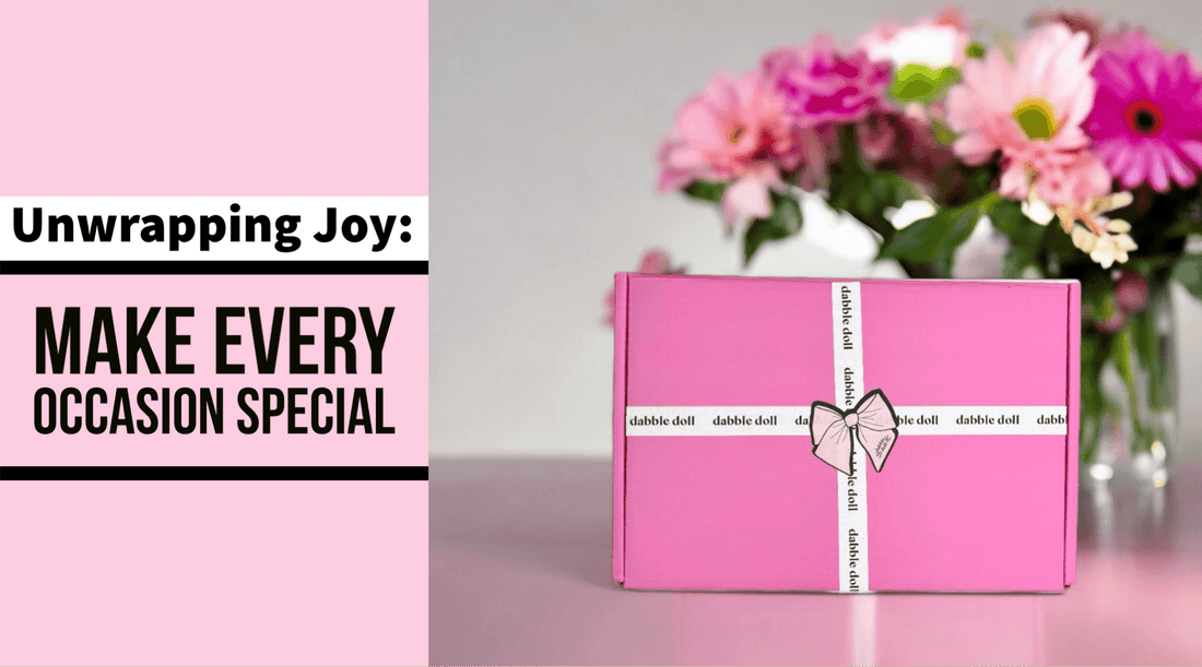 Pink gift box arrangement perfect for girls and women featuring a floral backdrop