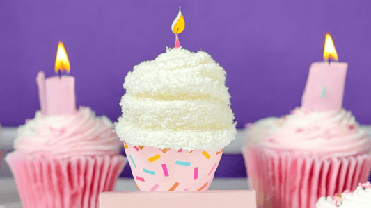 Birthday gift in a box featuring a pastel cupcake with candles, perfect for girls and women celebrating special occasions