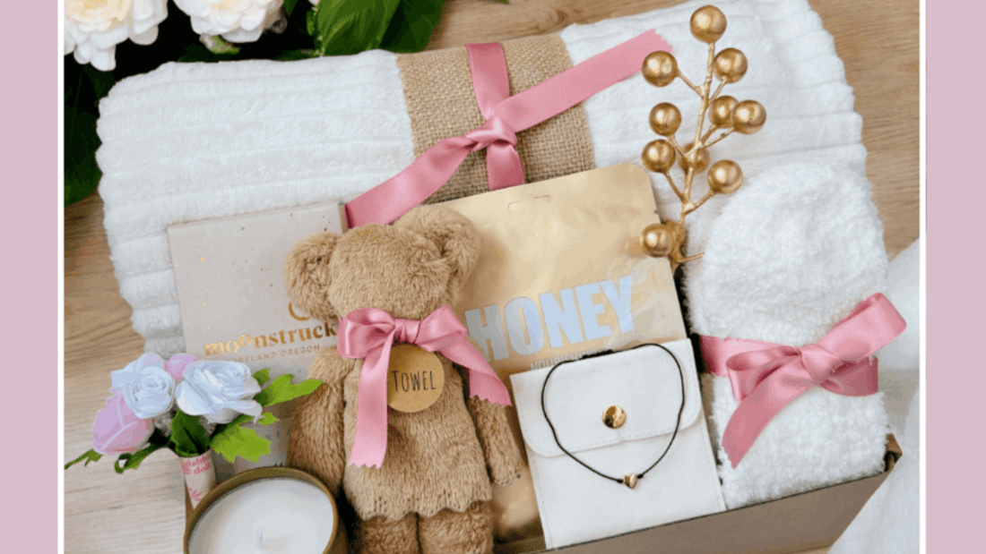 Gift ideas for girls featuring soft white towels, a teddy bear, and stylish jewelry in a cozy presentation