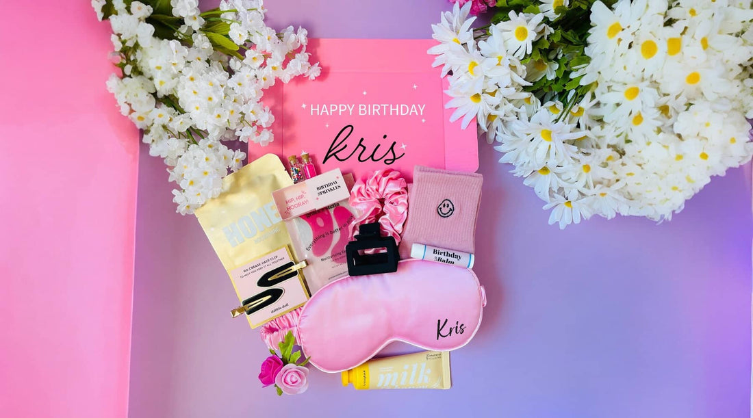 Curated birthday gift box for girls featuring pink sleep mask, accessories, and thoughtful items