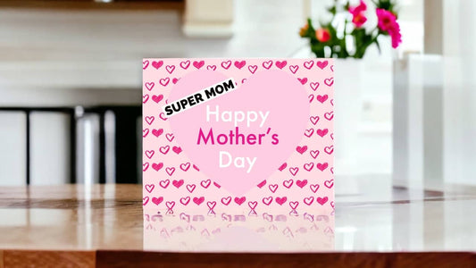 Printable mothers day card in pink with heart designs, perfect for girls and women to personalize for Mom