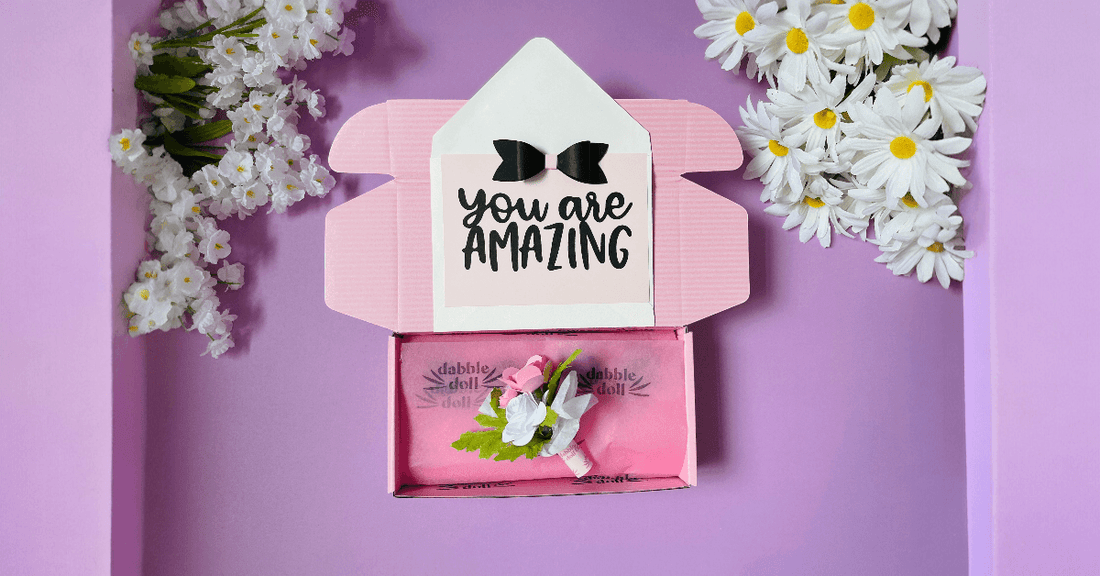 Pink gift box for girls featuring a floral embellishment and a heartfelt card saying You Are Amazing