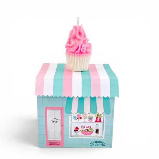 Cupcake stand with striped awning and pink cupcake on a white background