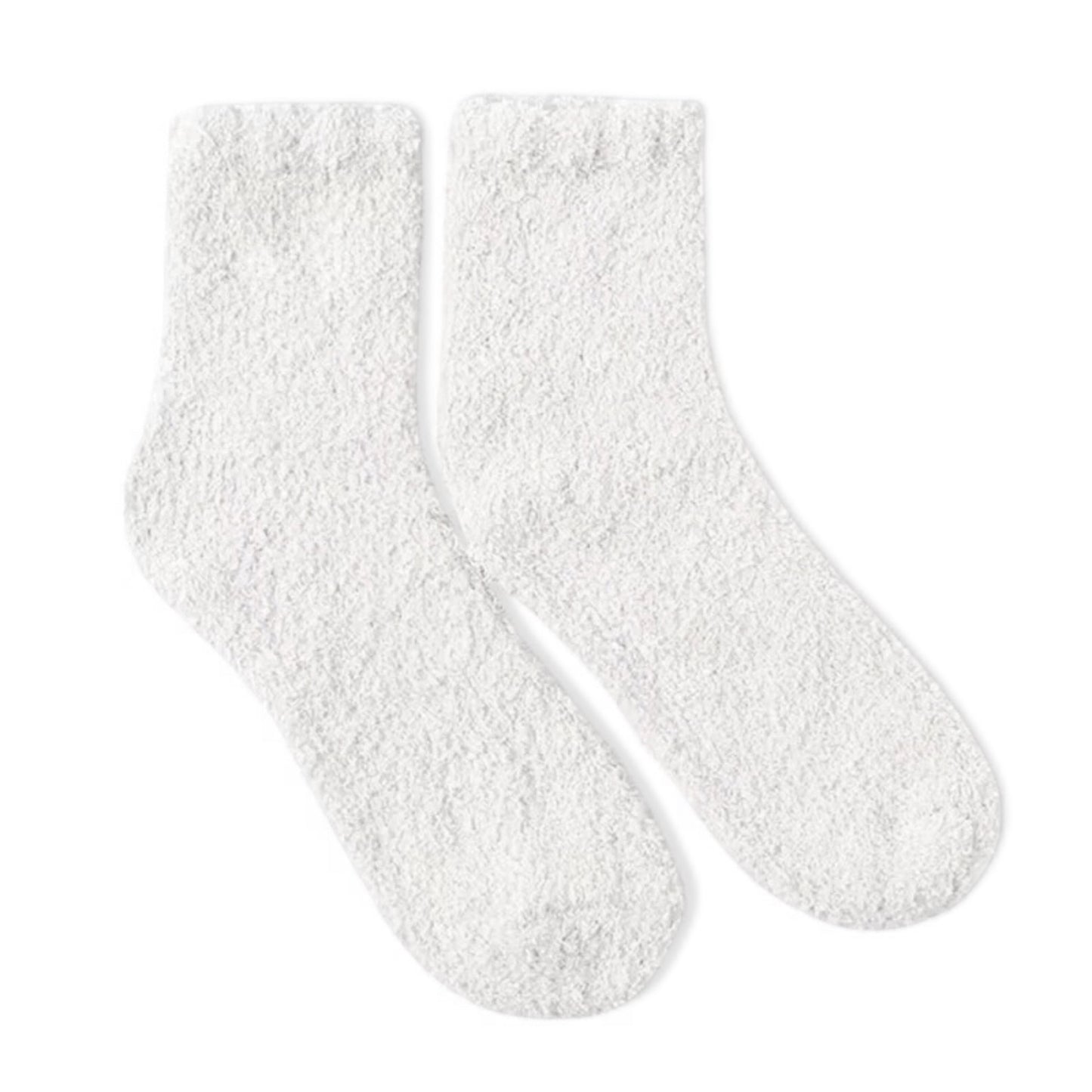 Pair of white fuzzy socks on a white background