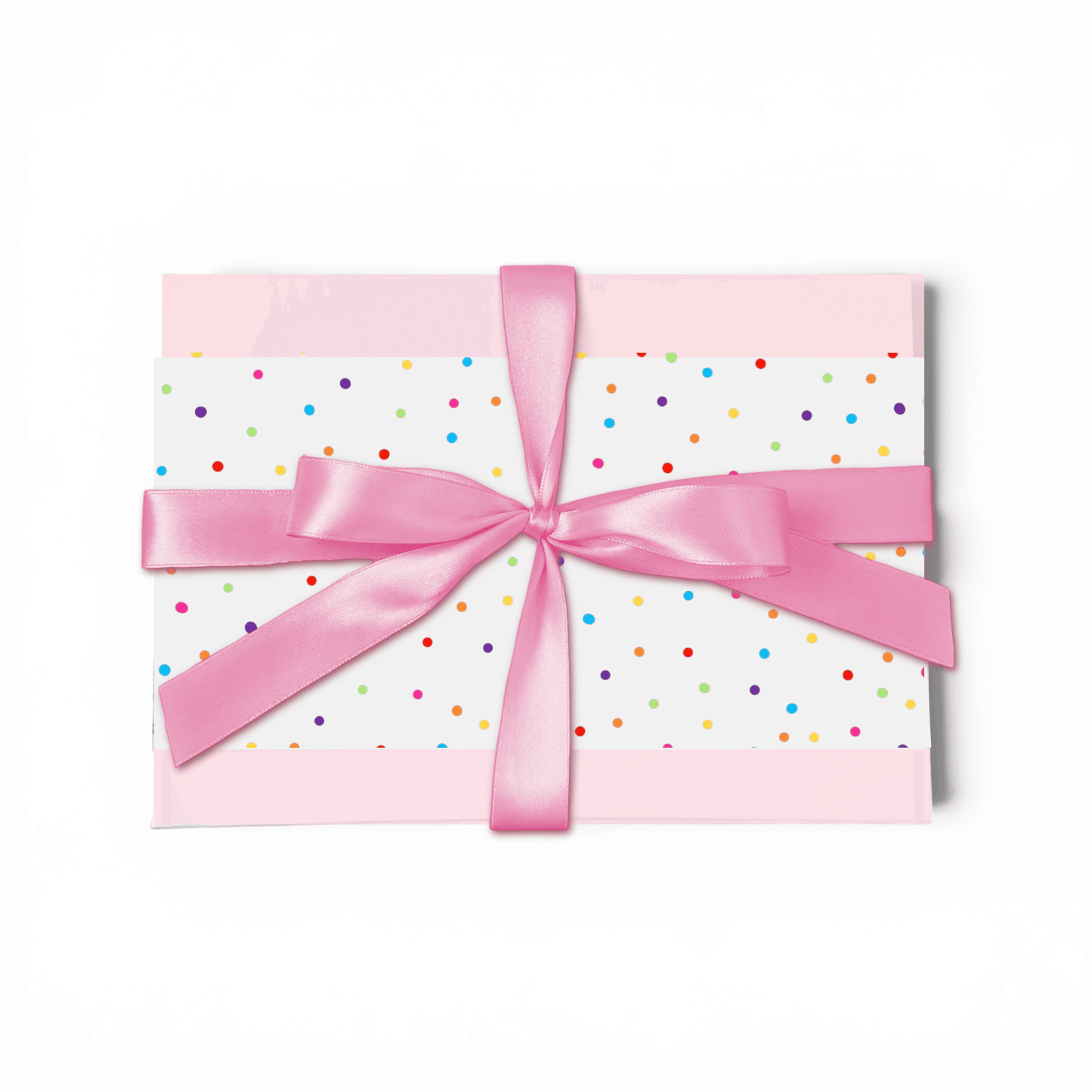 Gift box with colorful polka dots and a pink ribbon on a white background