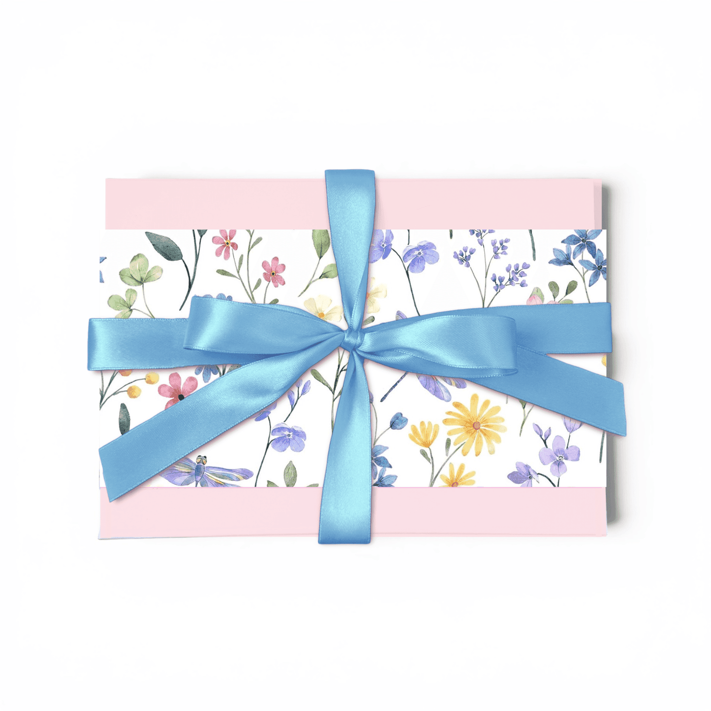 Gift box with floral design and blue ribbon on a white background