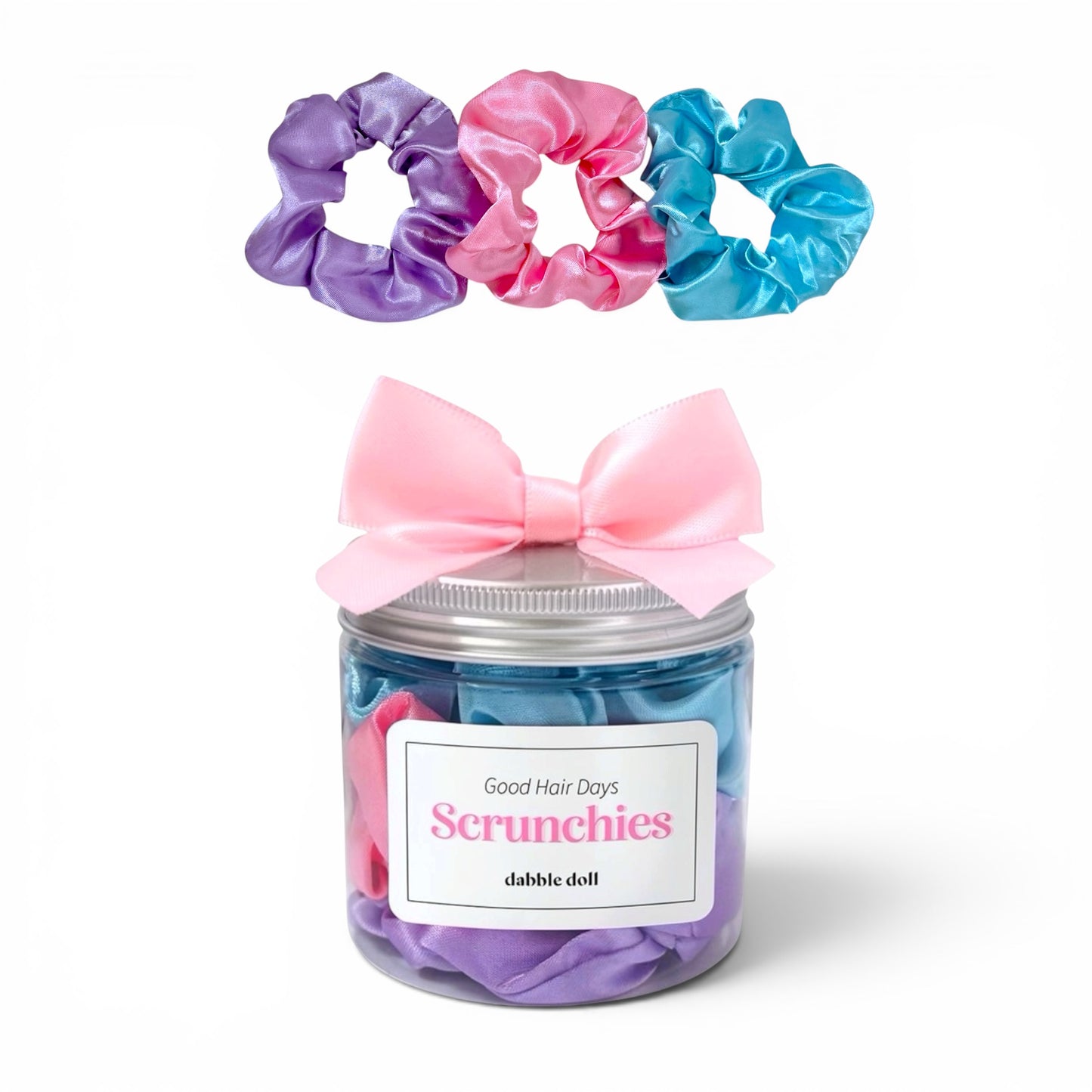Jar of scrunchies with a pink bow on a white background