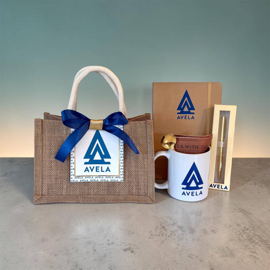 Avel Gift Box for Women featuring a Jute Bag, Coffee Mug, Journal, and Pen in Elegant Design