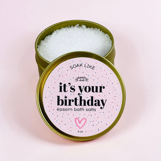Dabble Doll birthday gift box with It's Your Birthday Epsom bath salts in a green tin