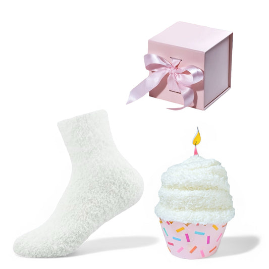Dabble Doll birthday gift socks with soft white socks, cupcake candle, and pink gift box with ribbon