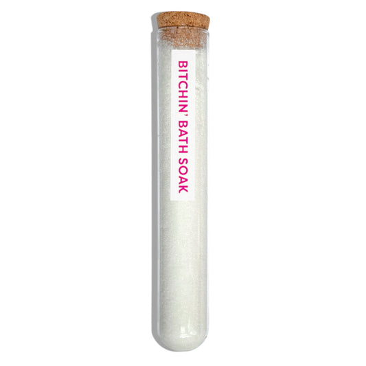 Dabble Doll Bitchin Bath Soak in a glass tube with a cork lid for a relaxing bath experience