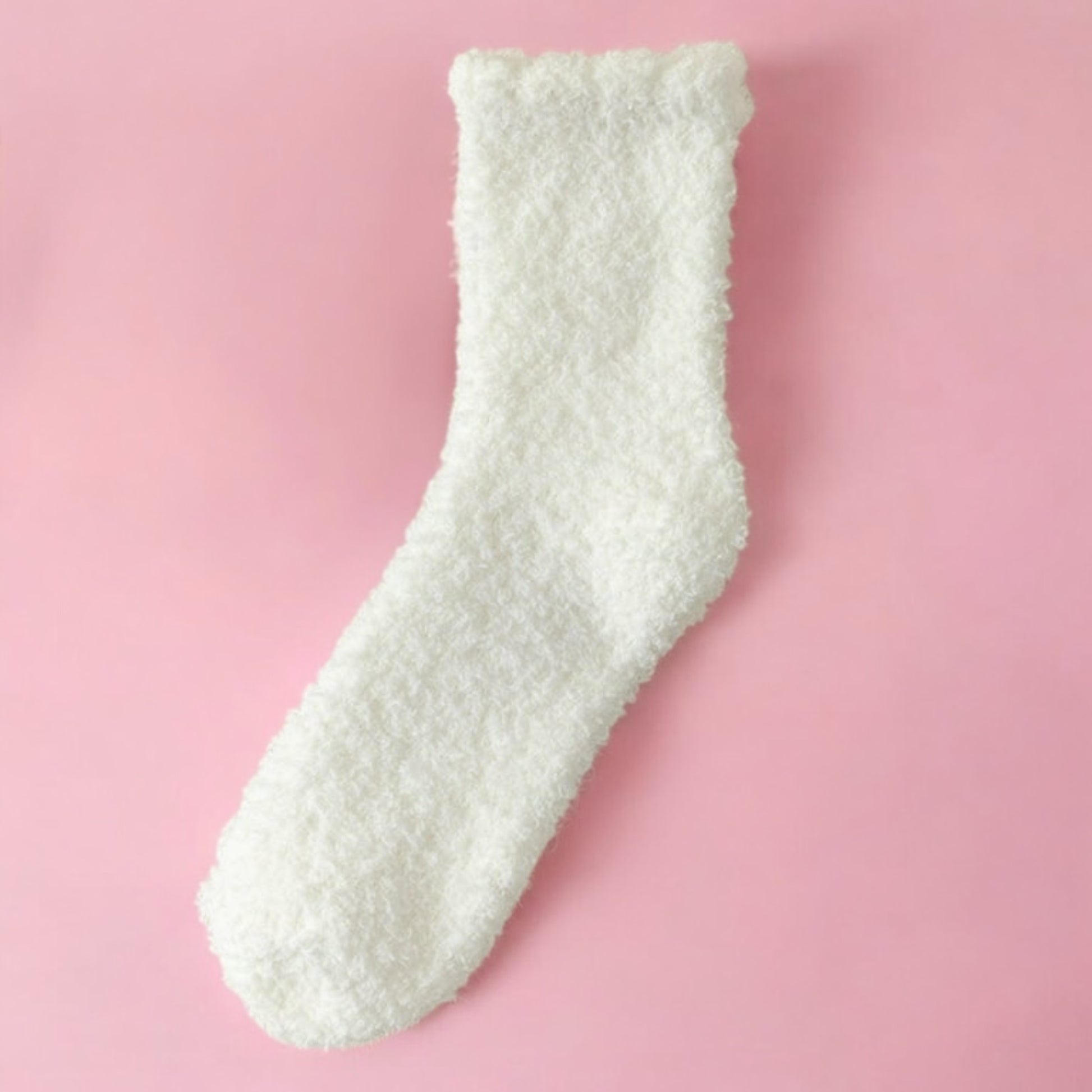 Cozy white fuzzy sock perfect for a care package or winter gift box