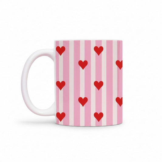 Dabble Doll ceramic mug featuring red hearts on pink striped background