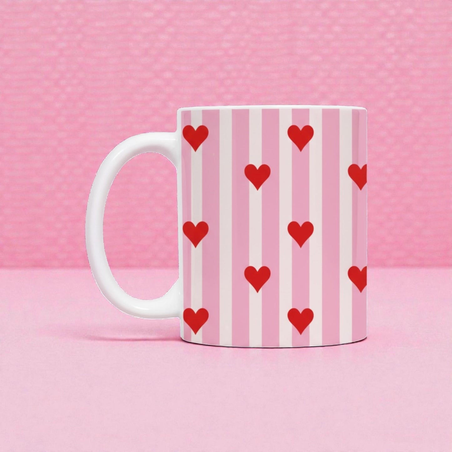 Dabble Doll ceramic mug with pink striped design and red hearts for a cute beverage experience