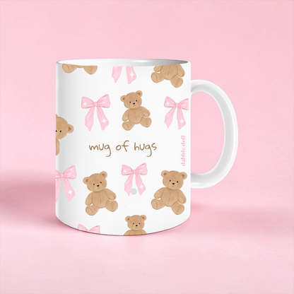 Dabble Doll coffee ceramic mug featuring a cute bear and pink bows design for a cozy beverage experience