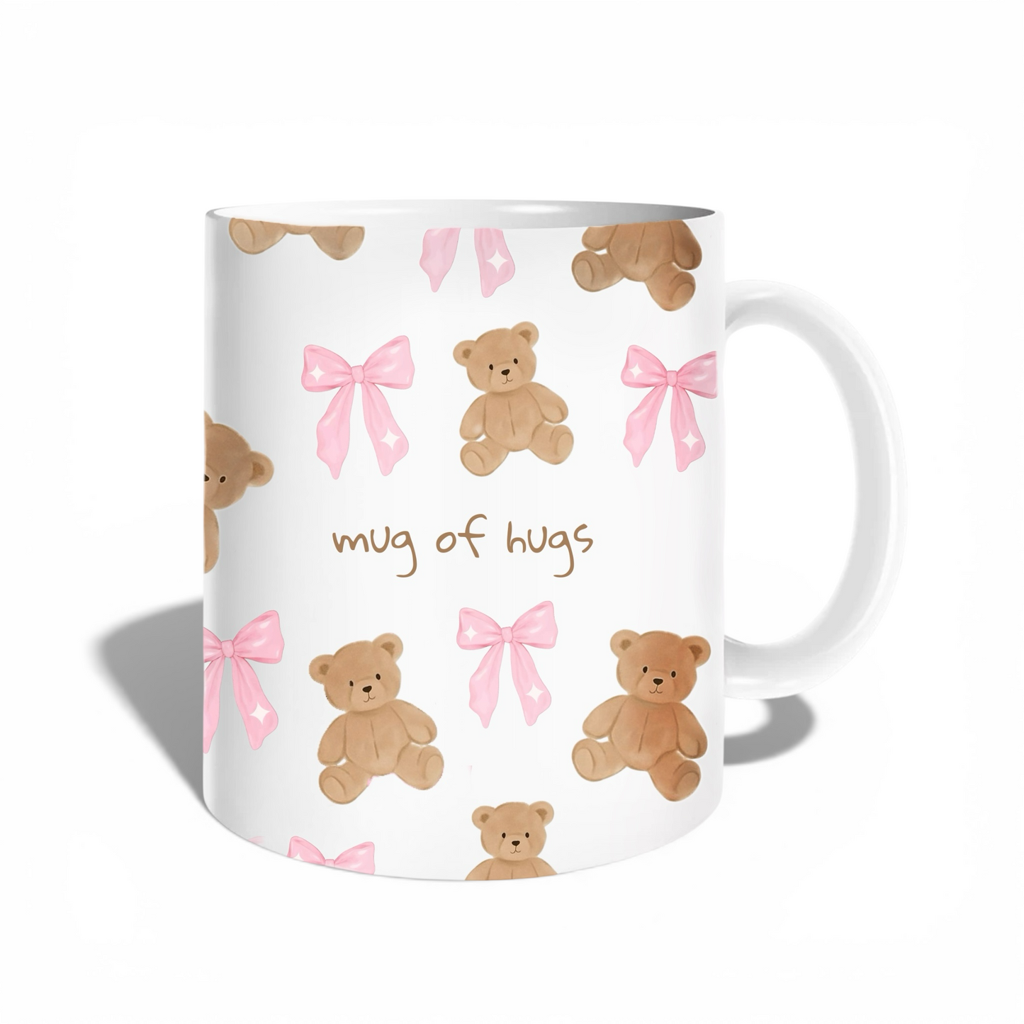 Cute coffee ceramic mug featuring teddy bears and pink bows with the text mug of hugs