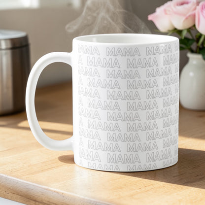 Dabble Doll coffee mug with repeating 'MAMA' design, perfect for moms enjoying their morning brew