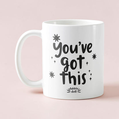 Dabble Doll coffee mug with inspiring text You've Got This and decorative stars