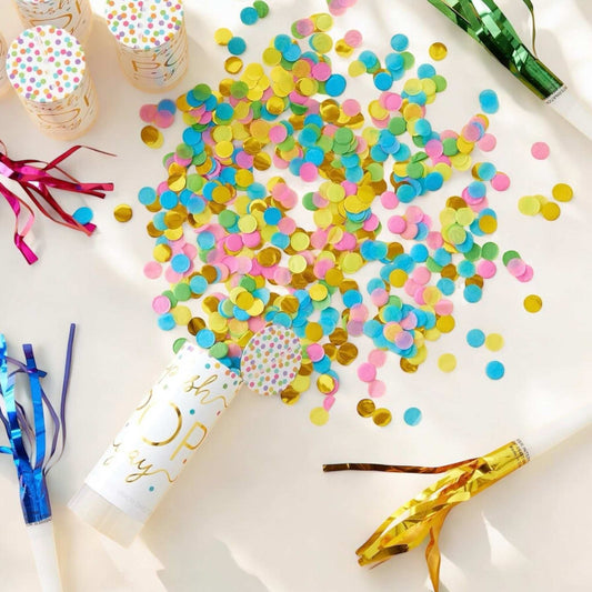 Colorful confetti popper for girls with white design, filled with pink, blue, and gold confetti for celebrations