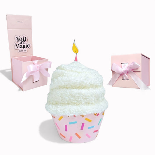 Dabble Doll Gift Box featuring cupcake socks with a festive cupcake design and bright colors
