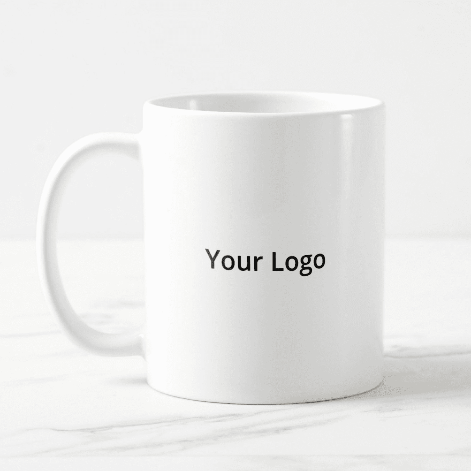 Customizable white ceramic mug featuring a personalized logo for branding and promotional use