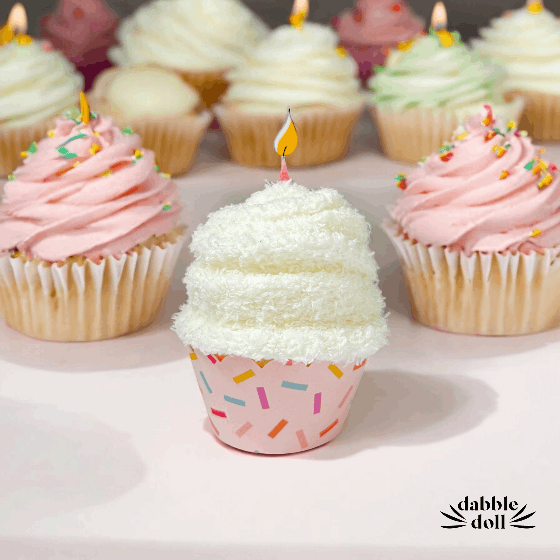 Dabble Doll birthday gift box featuring a cupcake design with sprinkles and candles for celebrations