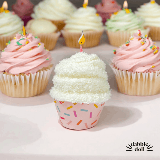Dabble Doll birthday gift box featuring a cupcake design with sprinkles and candles for celebrations