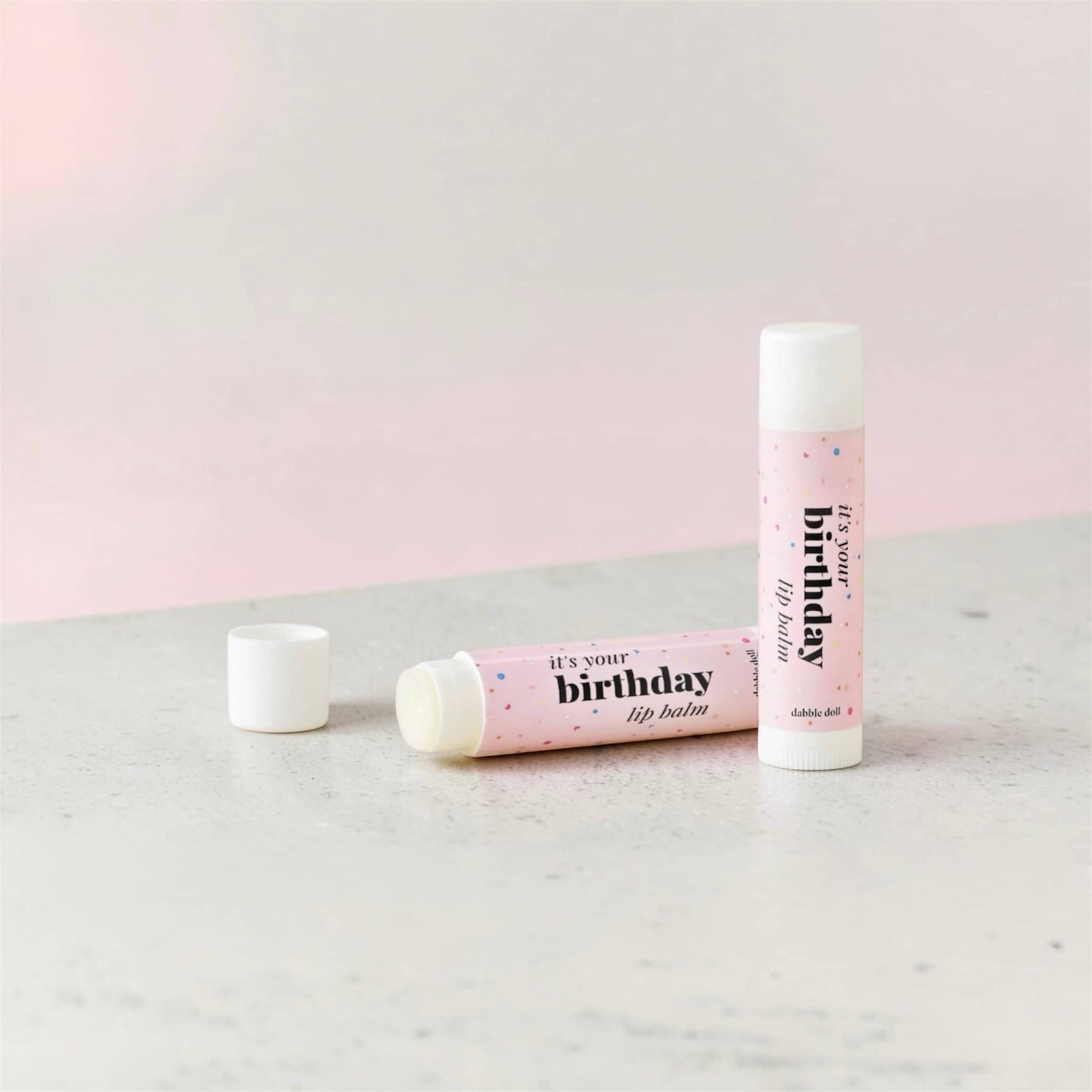 Dabble Doll It's Your Birthday Lip Balm in Pink Packaging for Birthday Celebrations