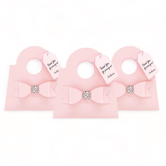 Dabble Doll blush mini purse favor bags with bow and rhinestone detail perfect for party favors