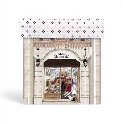 Dabble Doll Gift Box in pastel colors featuring a charming illustration, perfect for girls and women